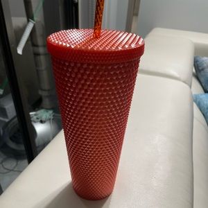 Starbucks Cup Orange with honeycomb texture. Without straw